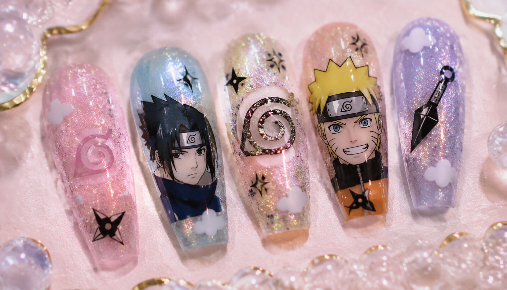 Detailed close-up showing the intricate hand-painted art of Naruto Glitter Pastel Coffin Anime Press-On Nails
